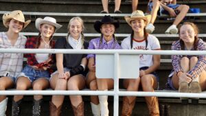 Fans of the Niceville high school Eagles smile before the Eagles game in Crestview. The Niceville high school fan base would arrive in force for the evenings contest Crist you would lose the battle to the visitors in a 35 to 14 contest.