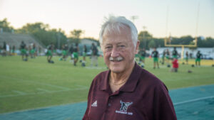 Niceville quarterback club supporter, Michael Flowers, an area attorney and former judge, sports his Niceville pride Before kickoff at the annual Niceville Choctaw football game. Flowers Eagles would win the day by a large margin.