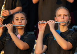 Two flutists warm up before the band plays for the Niceville Choctaw high school football game in Fort Walton Beach. The Eagle pride would assist the Eagles on the football field to a 42-25 win.
