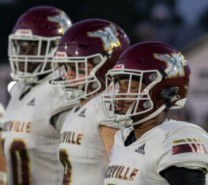 Niceville high school football captains stare down the Choctawhatchee Indian high school football captains and their pregame meeting with the referees. Nice Phil would win the coin toss and defer to the second half to receive.