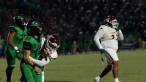 Carter Marraco of Choctawhatchee high school watches as the ball he’s thrown to a receiver, heads down the field. The Eagles would be able to throw a couple of devastating long passes throughout the game, but it would not be enough to keep up with the Niceville Eagles offensive production.