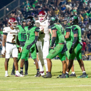 Niceville’s Eddie Love, Junior and Choctaw’s Jeremiah Clay engage in some extracirricular jawing after the whistle. The Eagles would end up having the last word with a statement 42-25 win over the Indians.
