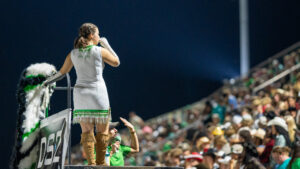 Choctawhatchee High School’s Drum Major gazes out at the schools marching band in the stands. The Style Marchers played loud and proud throughout the evening.