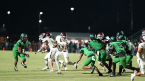 JJ Lewis moves upfield as a pack of Choctawhatchee Indians move to intercept him. Lewis’ abilities on the ground would cause headaches all evening for the Choctawhatchee Indians defense.