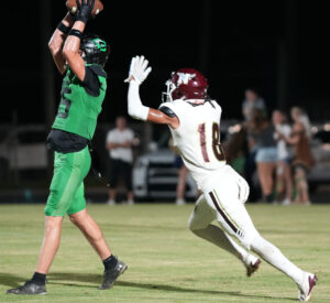 Choctaw’s Aaron Rowell pulls in a touchdown reception before Niceville’s Justus Donahoo lays a hit on him to try and knock the ball loose. Donahoo’s hit would not have an effect on the tough wideout. He’d secure the ball for six point