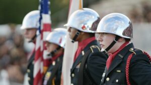 The Crestview high school JROTC honor guard stands at attention and ready to present the colors before crestviews game against Niceville high school. The army JROTC detachment presents the colors before every home game.