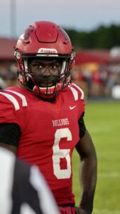 Zo morris, a Crestview Bulldogs captain, looks at the camera during the coin toss at their game against the Niceville Eagles on September 13, 2024.