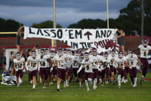 Teray Geiger and Jon Bocchino lead the Niceville Eagles onto the field against the Crestview Bulldogs. Niceville prove the better team on the evening defeating Crestview 35 to 14.