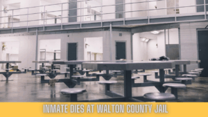 Interior view of a jail housing unit with metal tables and stools, captioned “Inmate Dies at Walton County Jail” in yellow banner text.