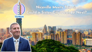 Niceville City Manager David Deitch in front of Taipei skyline with Taiwan graphic