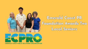 Four smiling people stand in front of an Emerald Coast Public Relations Organization banner with text reading “Emerald Coast PR Foundation Awards Two Local Seniors.”