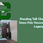 Graphic showing Choctawhatchee High School’s logo and a newly installed totem pole with the text “Standing Tall: Choctaw’s New Totem Pole Honors 73 Years of Legacy” on a green background.