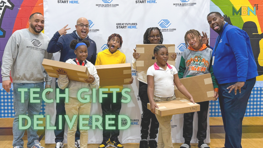 Local kids and families received 250 laptops through a partnership between Derrick Brooks Charities, AT&T, and Compudopt to help close the digital divide.