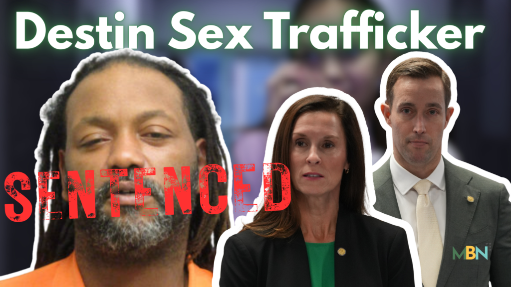 a man in jail uniform and two attorneys.