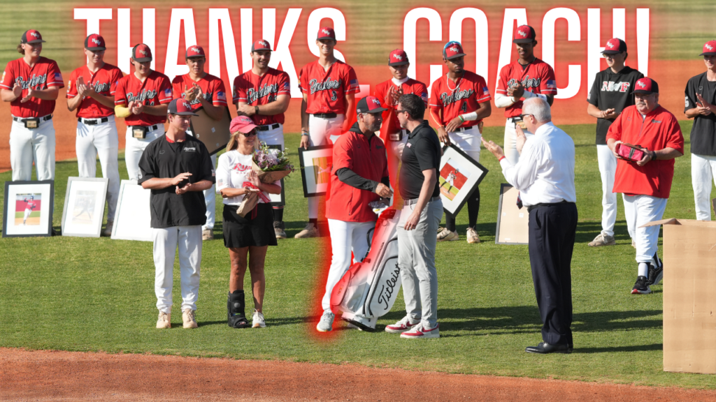 Baseball team on a field presenting awards; a coach receives flowers and a framed photo as players applaud, with a large 'THANKS COACH' banner above.