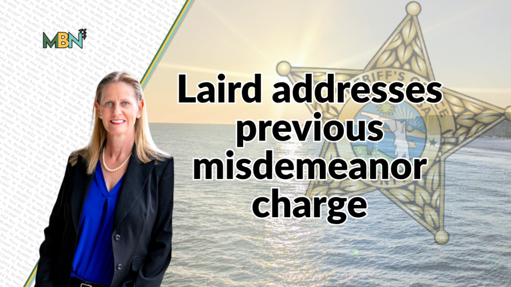 News thumbnail: woman in blue blouse and blazer, sheriff's badge background, water scene, headline 'Laird addresses previous misdemeanor charge'.