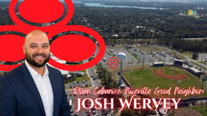 Promotional banner introducing Josh Wervey: a man in a suit in the foreground with an aerial town view, large red circular graphics, and the text 'Ryan Cabaniss Niceville Good Neighbor: JOSH WERVEY' (MBN logo upper right).