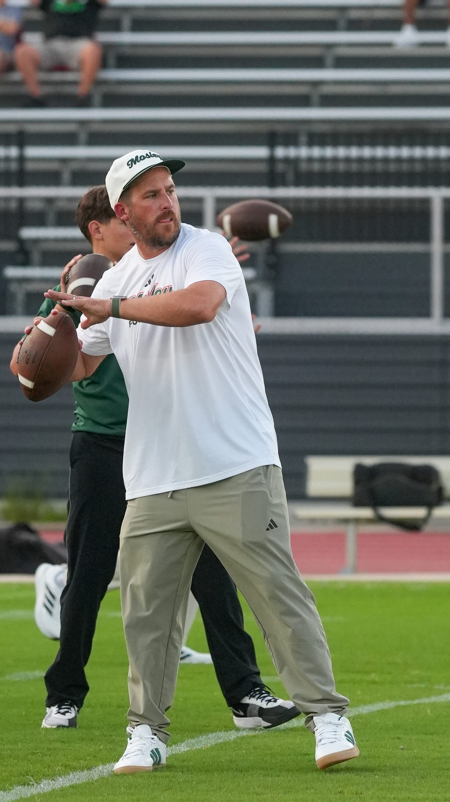 a man throws a football